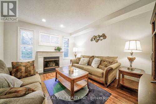 41 Timbercreek Court, Toronto, ON - Indoor Photo Showing Living Room With Fireplace