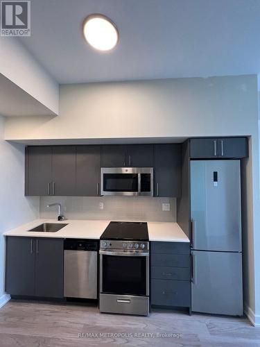 1402 - 38 Monte Kwinter Court, Toronto, ON - Indoor Photo Showing Kitchen