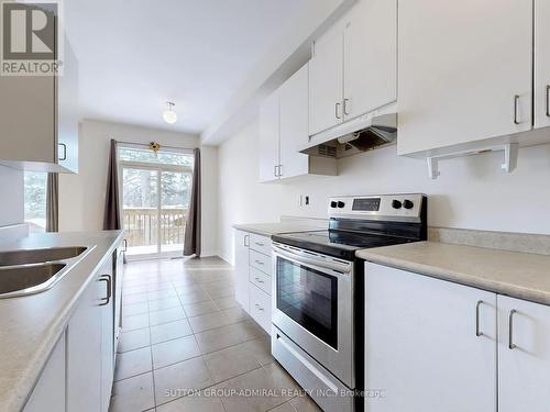 42 Greenwood Drive, Essa, ON - Indoor Photo Showing Kitchen With Stainless Steel Kitchen With Double Sink