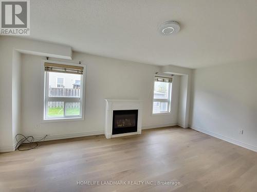 37 Maple Crown Terrace, Barrie, ON - Indoor Photo Showing Living Room With Fireplace