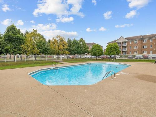 Pool - 330-3415 Boul. Albert-Chrétien, Québec (Beauport), QC - Outdoor With In Ground Pool With Backyard