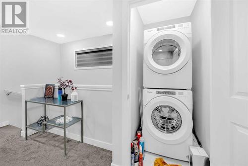 221 Belmont Street Sw, Calgary, AB - Indoor Photo Showing Laundry Room