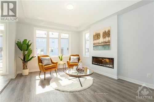 212 Ormiston Crescent, Ottawa, ON - Indoor Photo Showing Living Room With Fireplace