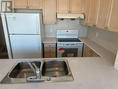 804 - 60 Brian Harrison Way, Toronto, ON - Indoor Photo Showing Kitchen With Double Sink