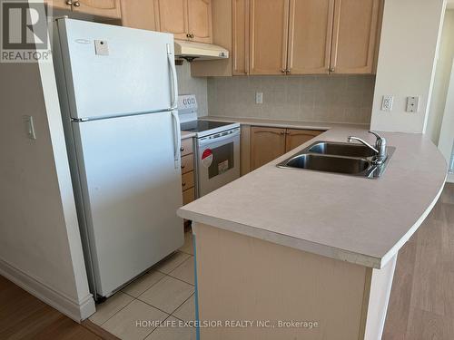 804 - 60 Brian Harrison Way, Toronto, ON - Indoor Photo Showing Kitchen With Double Sink