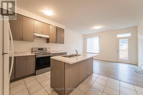 1523 Carr Landing, Milton, ON - Indoor Photo Showing Kitchen With Double Sink