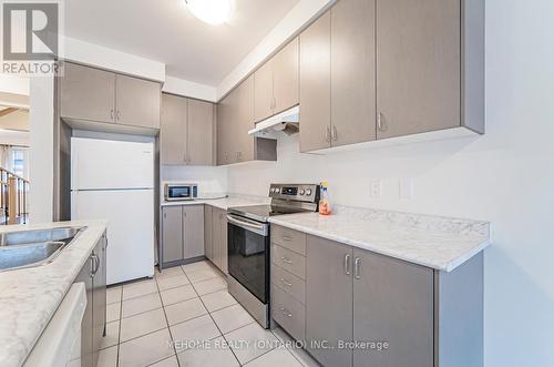 1523 Carr Landing, Milton, ON - Indoor Photo Showing Kitchen With Double Sink