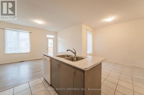 1523 Carr Landing, Milton, ON - Indoor Photo Showing Kitchen With Double Sink