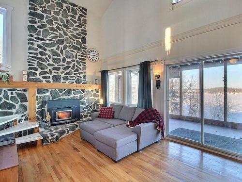 Living room - 171 Ch. Gagnon, Saint-Mathieu-D'Harricana, QC - Indoor Photo Showing Living Room With Fireplace