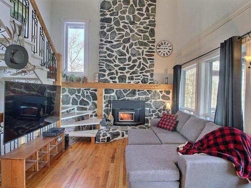 Living room - 171 Ch. Gagnon, Saint-Mathieu-D'Harricana, QC - Indoor Photo Showing Living Room With Fireplace