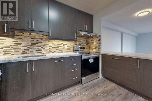 308 - 2500 Bridletowne Circle, Toronto, ON - Indoor Photo Showing Kitchen With Upgraded Kitchen