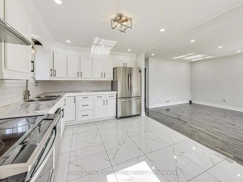 763 Tate Ave, Hamilton, ON - Indoor Photo Showing Kitchen With Double Sink