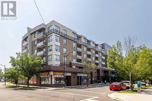 319, 955 Mcpherson Road Ne, Calgary, AB - Outdoor With Balcony With Facade