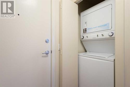 319, 955 Mcpherson Road Ne, Calgary, AB - Indoor Photo Showing Laundry Room