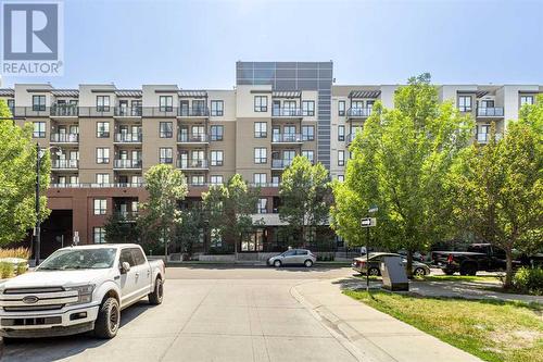 319, 955 Mcpherson Road Ne, Calgary, AB - Outdoor With Balcony With Facade