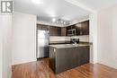 319, 955 Mcpherson Road Ne, Calgary, AB  - Indoor Photo Showing Kitchen With Double Sink 