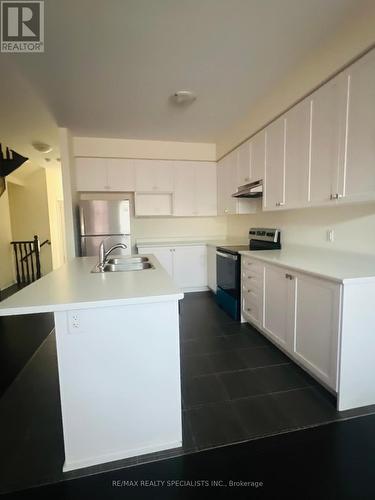 30 Brixham Lane, Brampton, ON - Indoor Photo Showing Kitchen With Double Sink