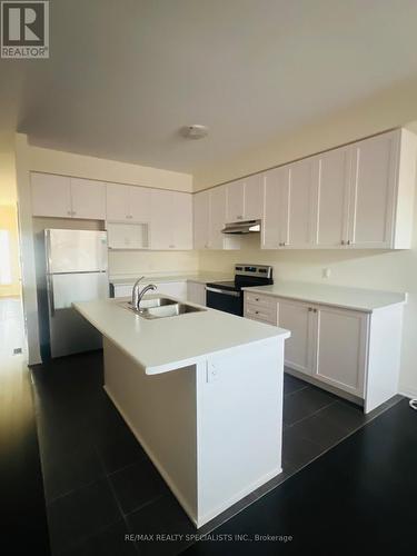 30 Brixham Lane, Brampton, ON - Indoor Photo Showing Kitchen With Stainless Steel Kitchen With Double Sink