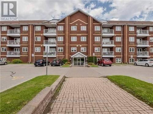 417 - 195 Lake Driveway Drive, Ajax (South West), ON - Outdoor With Balcony With Facade