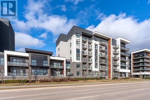 613 - 102 Grovewood Common, Oakville, ON - Outdoor With Facade