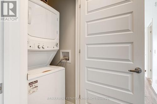 613 - 102 Grovewood Common, Oakville, ON - Indoor Photo Showing Laundry Room