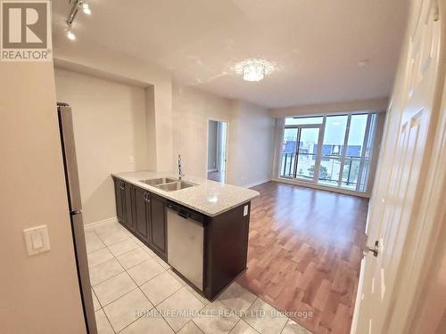 617 - 339 Rathburn Road W, Mississauga, ON - Indoor Photo Showing Kitchen With Double Sink