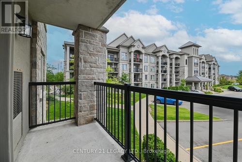 214 - 1460 Main Street E, Milton, ON - Outdoor With Balcony