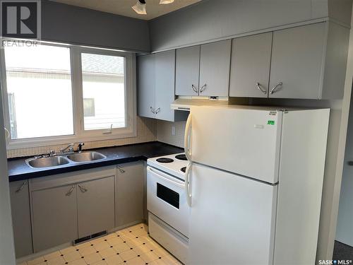 300 Cheri Drive, Nipawin, SK - Indoor Photo Showing Kitchen With Double Sink