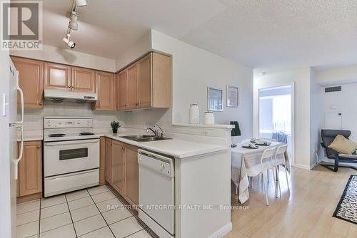 506 - 23 Lorraine Drive, Toronto, ON - Indoor Photo Showing Kitchen With Double Sink