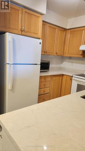 506 - 23 Lorraine Drive, Toronto, ON - Indoor Photo Showing Kitchen