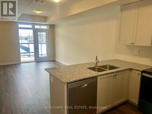 107 - 1577 Rose Way, Milton, ON - Indoor Photo Showing Kitchen With Double Sink