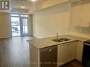 107 - 1577 Rose Way, Milton, ON  - Indoor Photo Showing Kitchen With Double Sink 