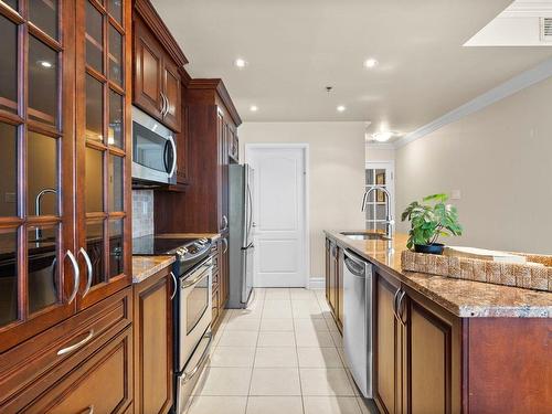 Cuisine - 210-50 Rue Barnett, Dollard-Des-Ormeaux, QC - Indoor Photo Showing Kitchen With Upgraded Kitchen