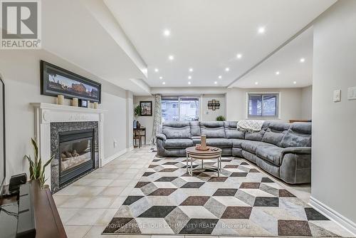 2481 Cobbinshaw Circle, Mississauga, ON - Indoor Photo Showing Living Room With Fireplace