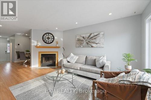 12 Claridge Drive N, Ottawa, ON - Indoor Photo Showing Living Room With Fireplace