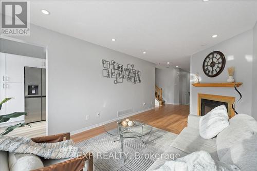 12 Claridge Drive N, Ottawa, ON - Indoor Photo Showing Living Room With Fireplace