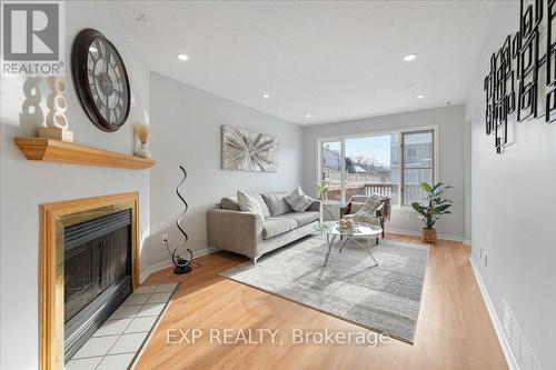 12 Claridge Drive N, Ottawa, ON - Indoor Photo Showing Living Room With Fireplace