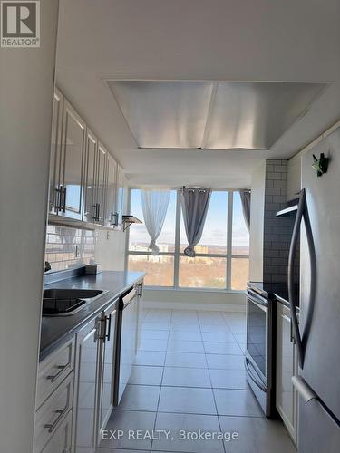 2111 - 3 Rowntree Road, Toronto, ON - Indoor Photo Showing Kitchen