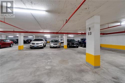 Owned underground parking spot - 700 Dynes Road Unit# 109, Burlington, ON - Indoor Photo Showing Garage