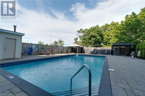 Salt water pool - 700 Dynes Road Unit# 109, Burlington, ON - Outdoor With In Ground Pool With Backyard