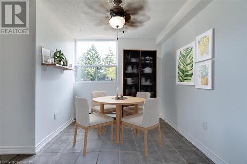 Virtually staged eating area - 700 Dynes Road Unit# 109, Burlington, ON - Indoor Photo Showing Dining Room