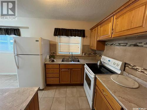 1982 13Th Street W, Prince Albert, SK - Indoor Photo Showing Kitchen With Double Sink