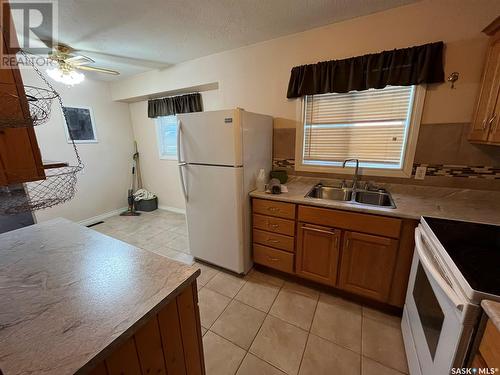 1982 13Th Street W, Prince Albert, SK - Indoor Photo Showing Kitchen With Double Sink