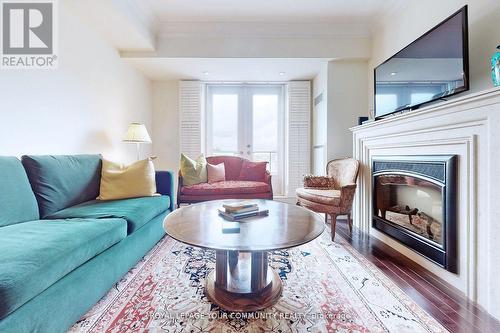 405 - 1717 Avenue Road, Toronto, ON - Indoor Photo Showing Living Room With Fireplace