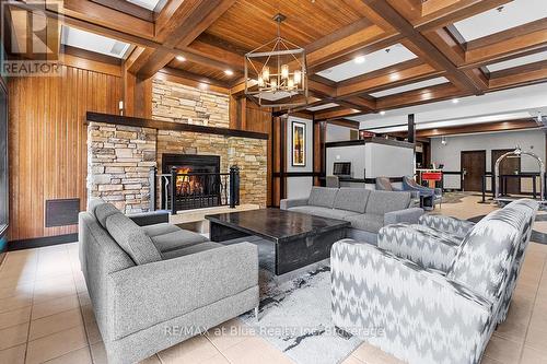 422 - 190 Jozo Weider Boulevard, Blue Mountains (Blue Mountain Resort Area), ON - Indoor Photo Showing Living Room With Fireplace