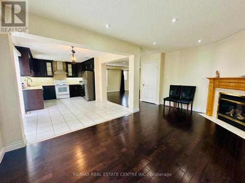 81 Botavia Downs Drive, Brampton, ON - Indoor Photo Showing Living Room With Fireplace