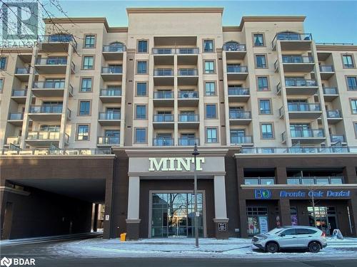 View of snow covered property - 2486 Old Bronte Road Unit# 813, Oakville, ON 