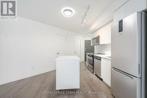 208 - 1401 O'Connor Drive, Toronto, ON - Indoor Photo Showing Kitchen