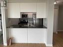 1602 - 50 Town Centre Court, Toronto, ON  - Indoor Photo Showing Kitchen With Double Sink 