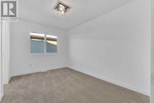 239 Kinniburgh Loop, Chestermere, AB - Indoor Photo Showing Other Room